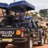 police patrol driver knock boda rider seated on his motorcycle