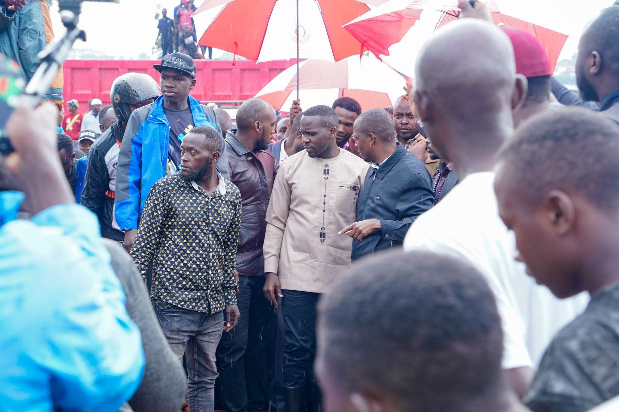 joel ssenyonyi visiting affected residents in nansana before being dispesed by police and military