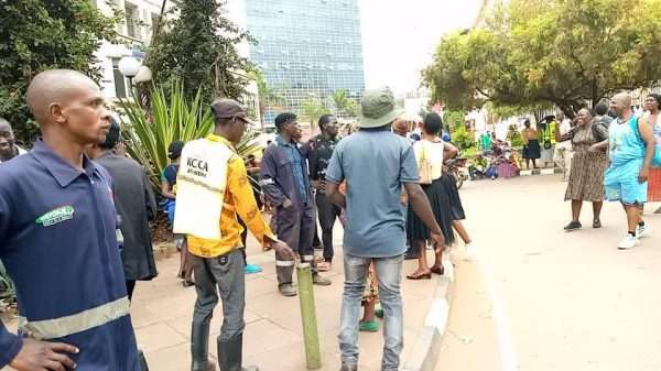 kcca workers stage strike at city hall in kampala yesterday